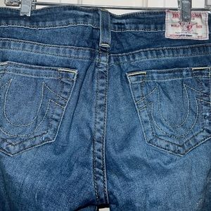 Dark Blue True Religion Jeans with rips